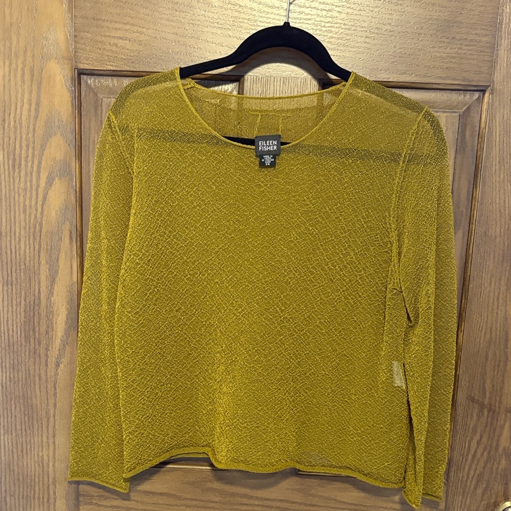This shear Eileen Fisher top is beautiful in color.